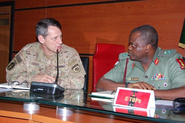 Brigadier General James B. Linder exchanging views with Major General John A H Ewansiha at the Army HQs Abuja. Photo by DAPR
