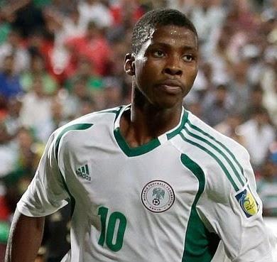 Nigeria's Kelechi Iheanacho, right, celebrates after scoring a goal against Mexico during the World Cup U-17 final soccer match between Nigeria and Mexico at Mohammad Bin Zayed stadium in Abu Dhabi, United Arab Emirates, Friday, Nov. 8, 2013. (AP Photo/Hassan Ammar)