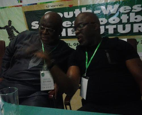 R-L: Amaju Pinnick, President, Nigeria Football Federation in a discussion with Seyi Akinwunmi, Co-ordinator, South-West States Football Forum at the maiden South-West States Football Summit held in Abeokuta on Friday.