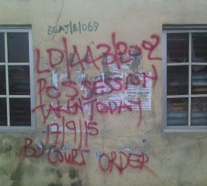 Red marking daubed on houses
