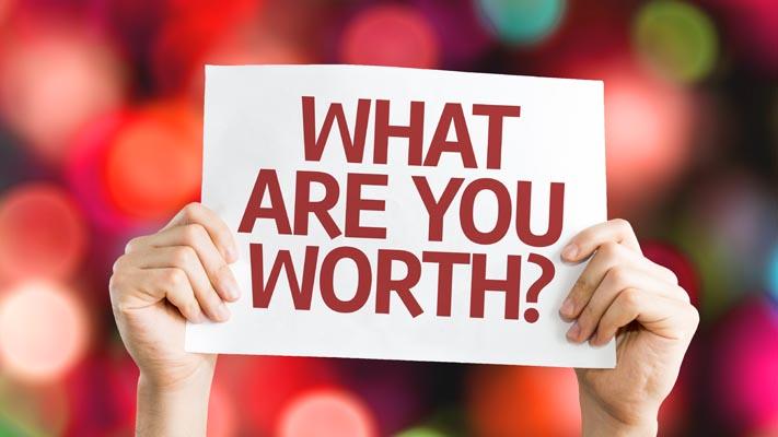 What Are You Worth? card with colorful background with defocused