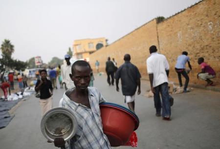 A man sells pots at a marketplace in Burundi's capital Bujumbura