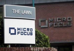 Signs stand outside the offices of Micro Focus after they and Hewlett Packard Enterprise Co announced that Hewlett Packard Enterprise Co will spin off and merge its non-core software assets with Britain's Micro Focus International in a deal worth $8.8 billion, in Newbury, Britain, September 8, 2016. REUTERS/Eddie Keogh