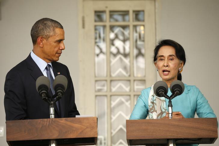 U.S. President Barack Obama and opposition politician Aung San Suu Kyi hold a press conference after their meeting at her residence in Yangon