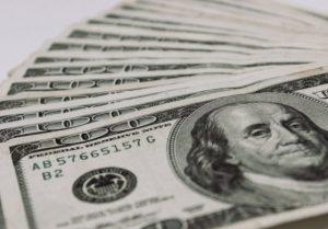 100-dollar-bills-1-560x390