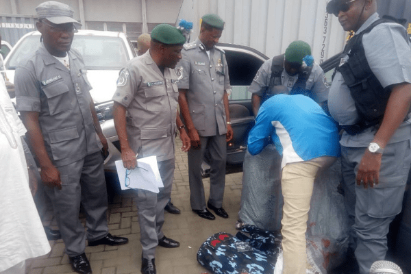 Nine days to election: Customs intercepts bales of police uniforms, tear gas