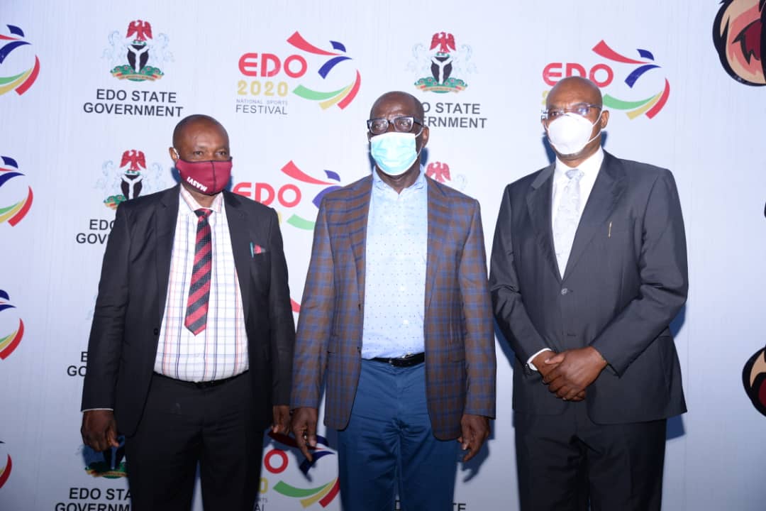 Godwin Obaseki (m), Edo State governor; Alex Oleiji (l), Commissioner for Environment and Sustainability, and Lawrence Osabuohien Ogieva, Commissioner for Art, Culture and Diaspora Affairs, after being sworn in by the governor, at Government House, in Benin City.
