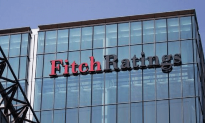 Fitch downgrades Dangote Industries as naira devaluation takes toll on earnings