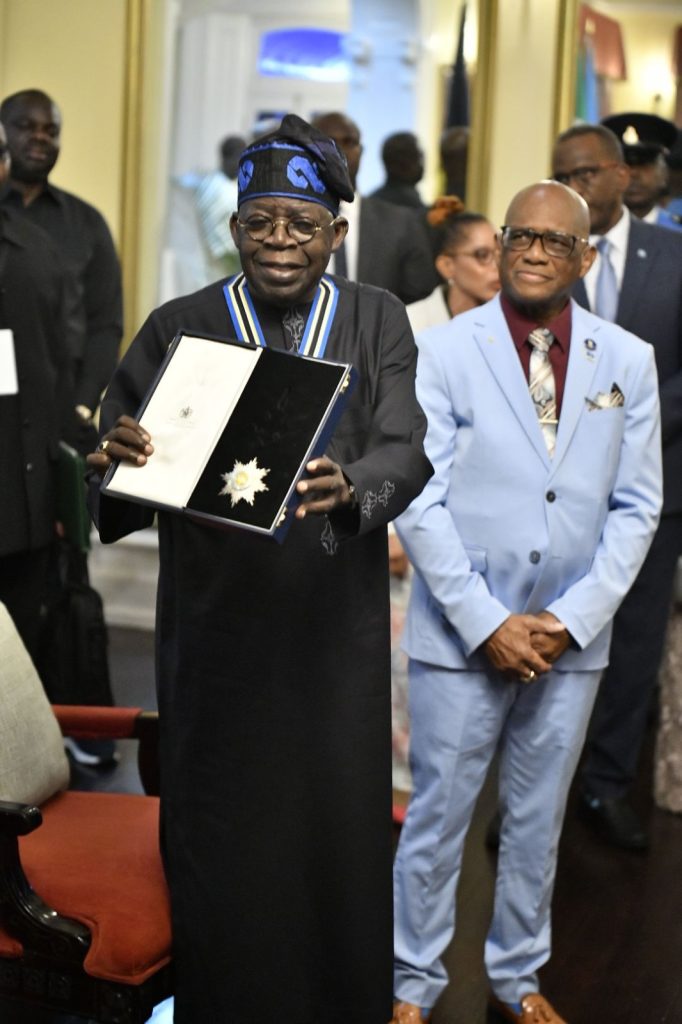 Bola Tinubu displays Saint Lucia's highest national honour after investiture by Phillip Pierre