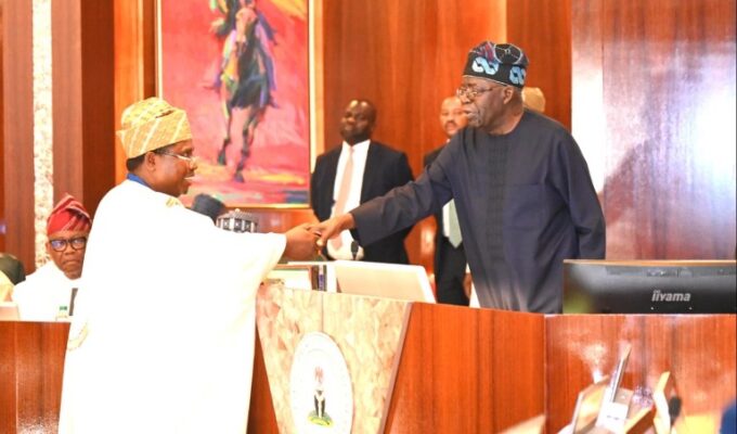Tinubu swears in Amupitan