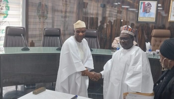 Amupitan swear in Adeniran Tella