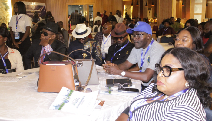 Gift Worlu (in blue cap) with economists and experts at the OBEF inauguration in Port Harcourt