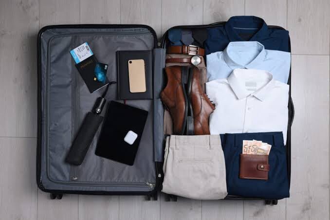 Essentials for a business trip: combining practicality, style, and thorough preparation