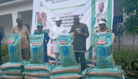 Jerry Uwangue, Edo State Commissioner for Agriculture and Food Security (3rd left) with some of the beneficiaries in Benin City, Edo State.